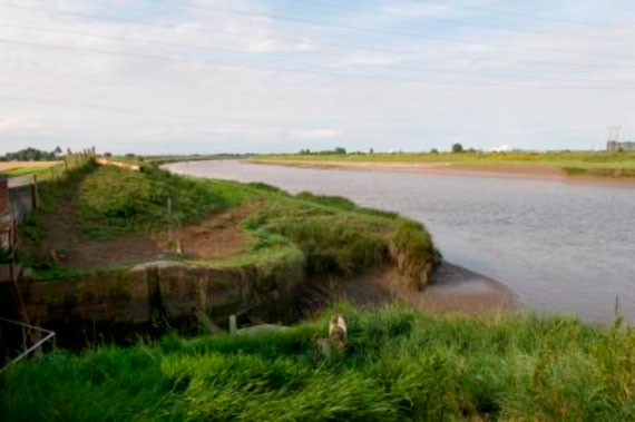 Outfall from Smeeth Load Drain into a wide tidal stretch of the River Great Ouse. On the Eau Brink Road in King’s Lynn IDB.