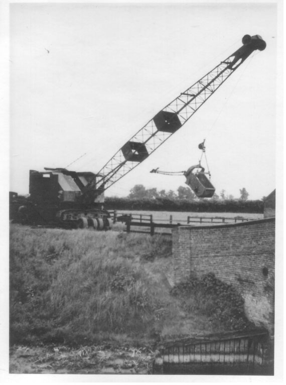 Historic image: an old dragline machine working on the maintenance of drain banks in South Holland