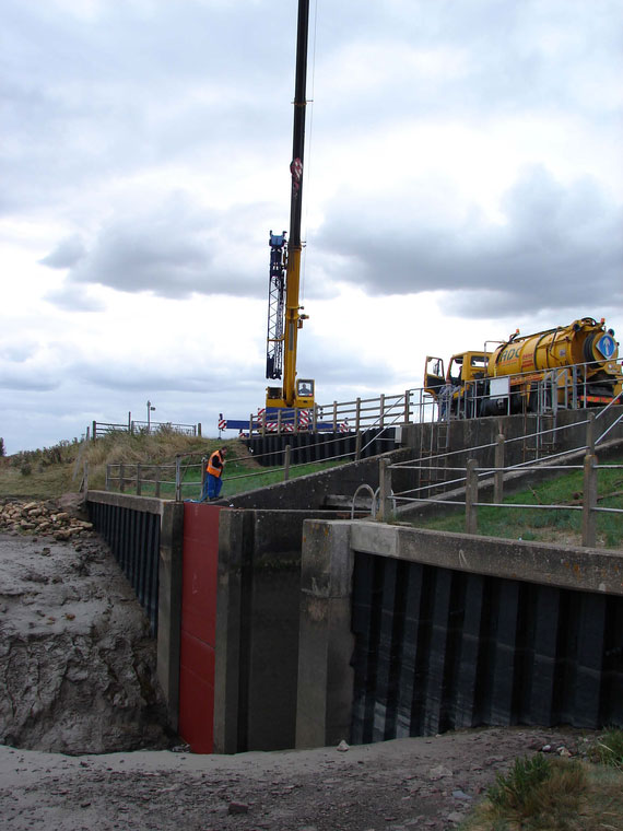 A piling rig working at Lutton Leam Sluice on the River Nene, South Holland IDB.