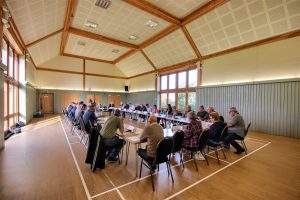 Members of the Broads IDB seated at a Board Meeting held at Hickling Barn community centre in the Norfolk Broads